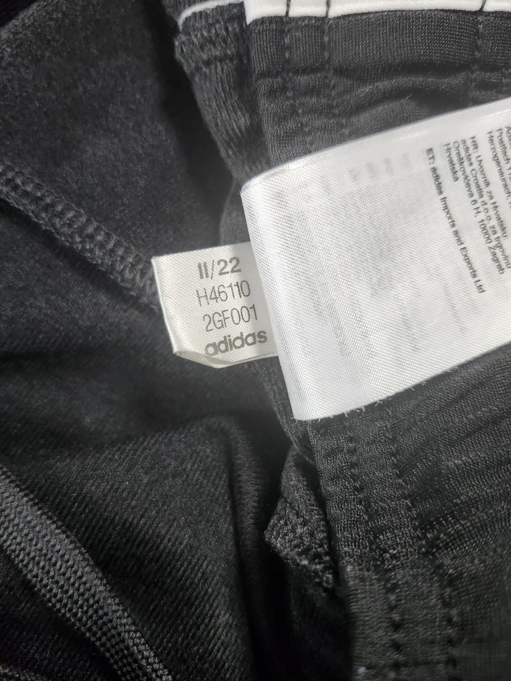 black Adidas activewear track pants white three-stripe detailing men's size XL